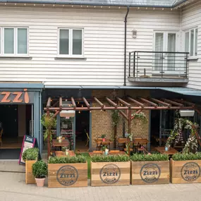 Seaside Zizzi Whitstable exterior with nautical charm and welcoming  entrance featuring outdoor dining area