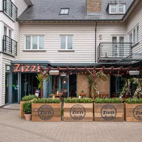 Seaside Zizzi Whitstable exterior with nautical charm and welcoming  entrance featuring outdoor dining area