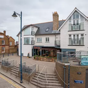 Seaside Zizzi Whitstable exterior with nautical charm and welcoming  entrance featuring outdoor dining area