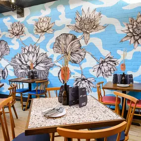Zizzi Basingstoke, bright dining space with feature mural and skylight