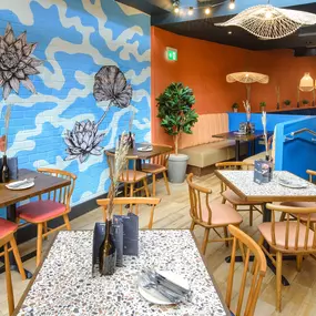 Zizzi Basingstoke, bright dining space with feature mural and skylight