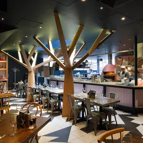 Warm and stylish Zizzi Worcester interior with Italian décor and open kitchen.