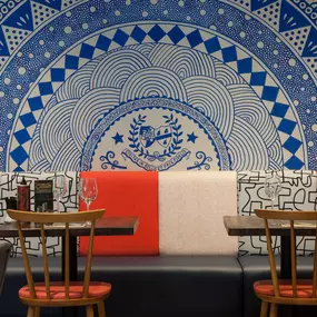 Warm and stylish Zizzi Worcester interior with Italian décor and open kitchen.