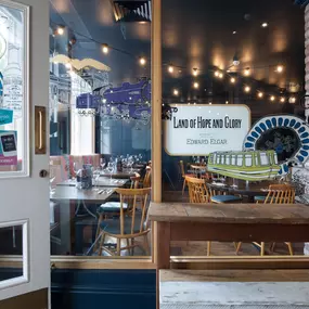 Warm and stylish Zizzi Worcester interior with Italian décor and open kitchen.