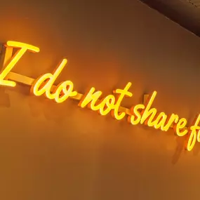 Zizzi Guildford, neon sign saying 'I do not share food'.