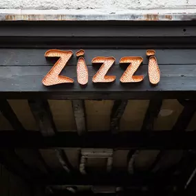Exterior of Zizzi Henley housed in a historic timber-framed coach house.