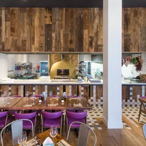 Stylish dining area at Zizzi Bradford with modern decor and natural accents.