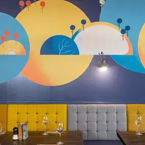Stylish dining area at Zizzi Sevenoaks with modern decor and natural accents.