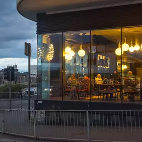 Zizzi Inverness, front-area glass wall offering street visibility and river outlook.
