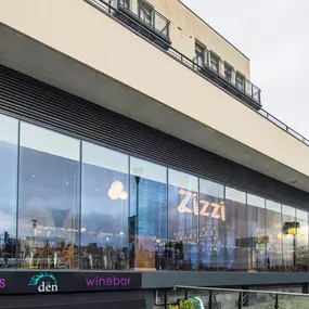 Zizzi Inverness, front-area glass wall offering street visibility and river outlook.