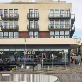 Zizzi Inverness, front-area glass wall offering street visibility and river outlook.