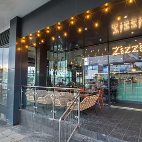Zizzi Inverness, front-area glass wall offering street visibility and river outlook.