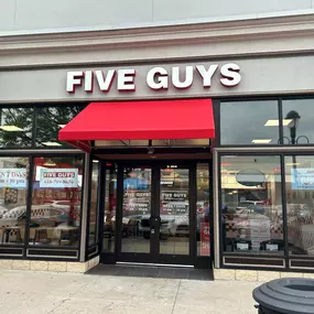 Exterior photograph of the Five Guys restaurant at 3045 Center Valley Parkway in Center Valley, Pennsylvania.