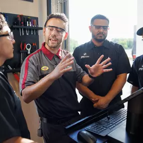 Jiffy Lube oil change team huddle