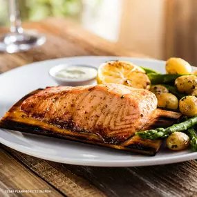 Cedar Plank-roasted Salmon with seasonal vegetables, marble potatoes and dill-mustard sauce