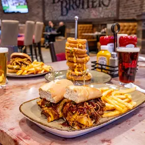 Date night, game night, or any night—Brew Brothers at Harrah's Kansas City Hotel & Casino always hits the spot! From snack-worthy bites to tasty meals, they’ve got the goods to keep you coming back every day. Brew Brothers is the ultimate sports bar experience for beer, food, and sports lovers alike.