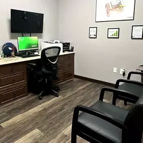Interior photo of the consultation office in the AudioNova hearing clinic in Leesburg, FL on Highway 27