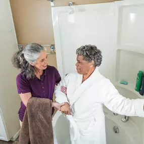 Caregiver assisting client with personal care