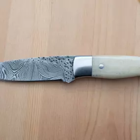 Bone handle Damascus steel hunting knife from Faneema Cutlery