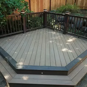 Custom Deck with railings and deck lighting built by Heilman Deck & Fence