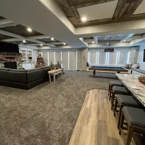 Outfit your basement recreation space with versatile custom shades from GrandView Blinds & Designs. This multi-functional room features shades providing essential light control and privacy for entertainment zones, windows, and sliding glass doors.