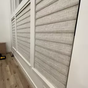 Experience versatile light control with custom banded (zebra) shades from GrandView Blinds & Designs. These modern shades feature alternating sheer and opaque bands, allowing you to easily adjust between filtered light and privacy.