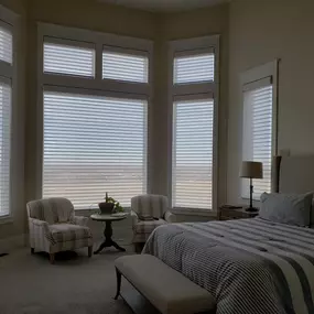 Enjoy softly diffused natural light and maintain your view with Hunter Douglas Pirouette window shadings from GrandView Blinds & Designs. Perfect for bedrooms, these elegant shadings offer UV protection and adjustable privacy with tilting fabric vanes.