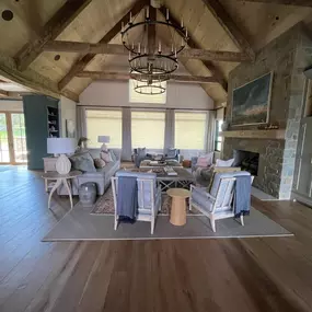 Enhance comfort and preserve scenic views in grand spaces with custom roller or solar shades from GrandView Blinds & Designs. These shades offer effective light filtering and glare reduction, integrating seamlessly with modern rustic architecture like vaulted ceilings and beams.