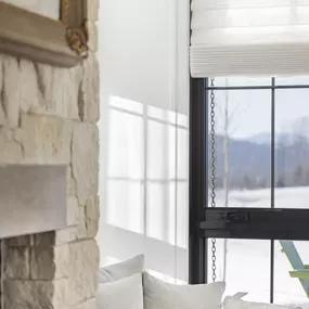 Add warmth and style with Roman shades from GrandView Blinds & Design. These versatile window treatments complement features like fireplaces and window seats, offering beauty and light control.