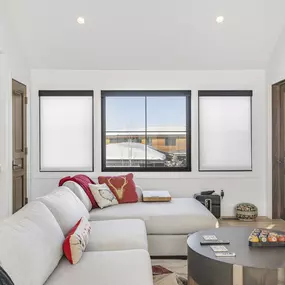 Enhance the comfort and style of your living space with custom roller shades from GrandView Blinds & Design. These sleek window treatments provide excellent light control and privacy.