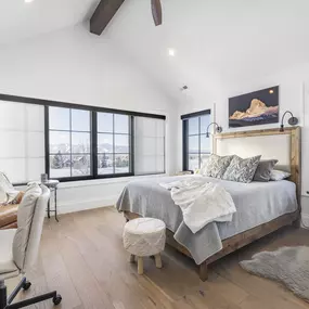 Optimize your bedroom's ambiance with roller shades from GrandView Blinds & Design. These custom window treatments provide effective light control and privacy, perfect for creating a comfortable retreat.