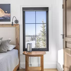 Find the perfect fit for every window with custom roller shades from GrandView Blinds & Design. Offering clean lines and essential light control, even for tall or narrow windows in bedrooms.