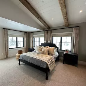 Complete your bedroom design with elegant custom curtains from GrandView Blinds & Design. Providing both privacy and a touch of sophistication, these drapes are perfect for windows and glass doors.