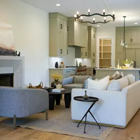 kitchen and living room area in a model home that can be built for the Peninsula at Wilson lake community