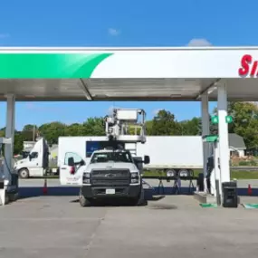 Sinclair gas station fueling island.