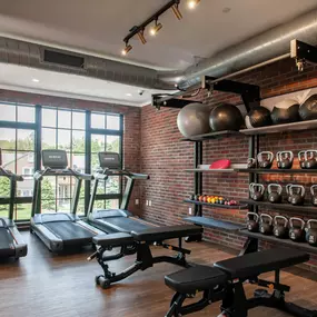 The fitness gym at The Mason Apartments supports a healthy lifestyle in a modern, energizing space.
