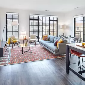 The living area at The Mason Apartments is the centerpiece of the open layout, offering comfort and style.