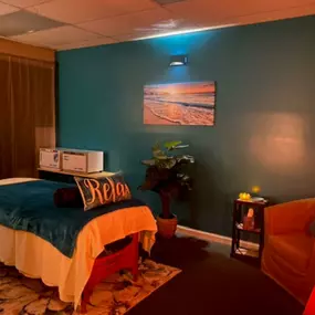 Cozy massage rooms with heated tables