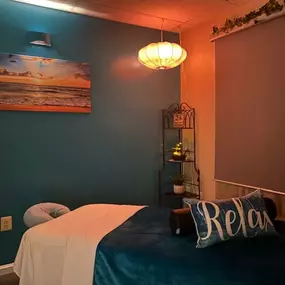 Cozy massage rooms with heated tables