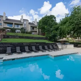 Pool with an outdoor grilling center