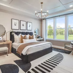 Luxurious first-floor primary bedroom suites