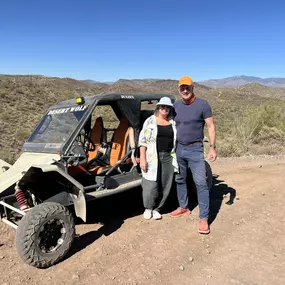 This happy couple is all smiles after their exhilarating guided ATV tour with Desert Wolf Tours! Explore the stunning Arizona desert together and make unforgettable memories on this thrilling adventure.