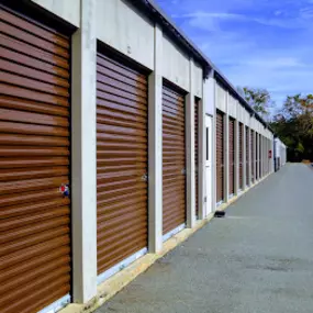 A side view of Live Oak Storage brown storage units