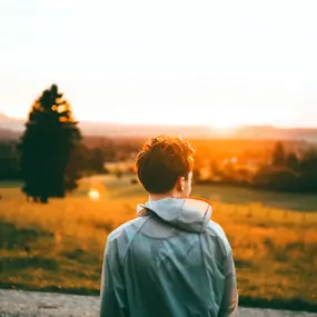 young man contemplating