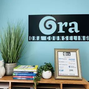 Ora counseling logo inside building