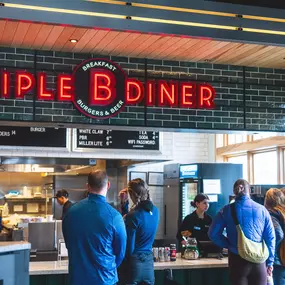 A group enjoys lunch at Triple B Diner at Tamarack Resort in The Village.