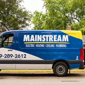 The Mainstream Home Services van parked at a job