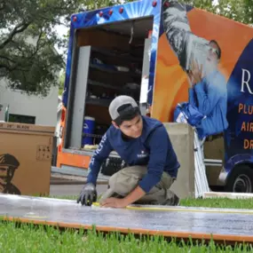 A Radiant employee working outside the box truck