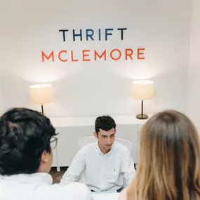 Thrift McLemore Receiving Clients at Atlanta Office Reception Desk
