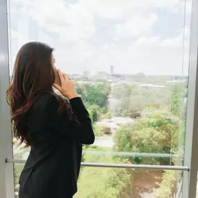 Thrift McLemore Attorney Talking on Phone in Atlanta Office Conference Room